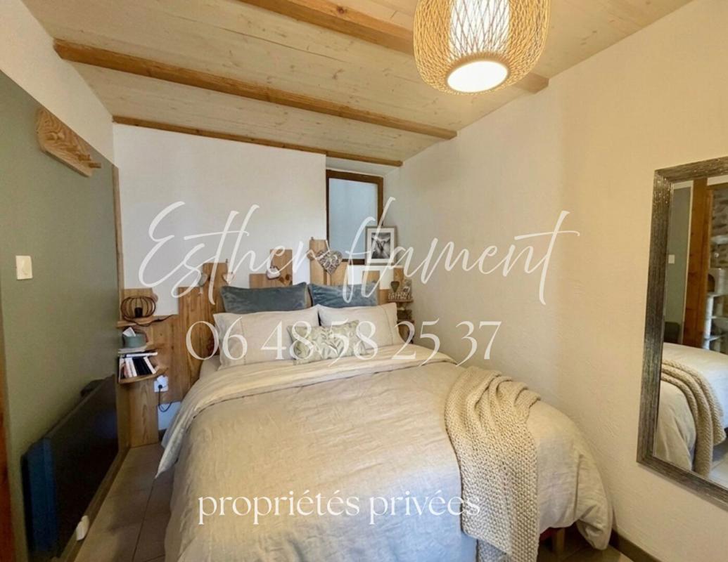 CARDET maison de village rénovée en pierre avec grand garage et cour 8