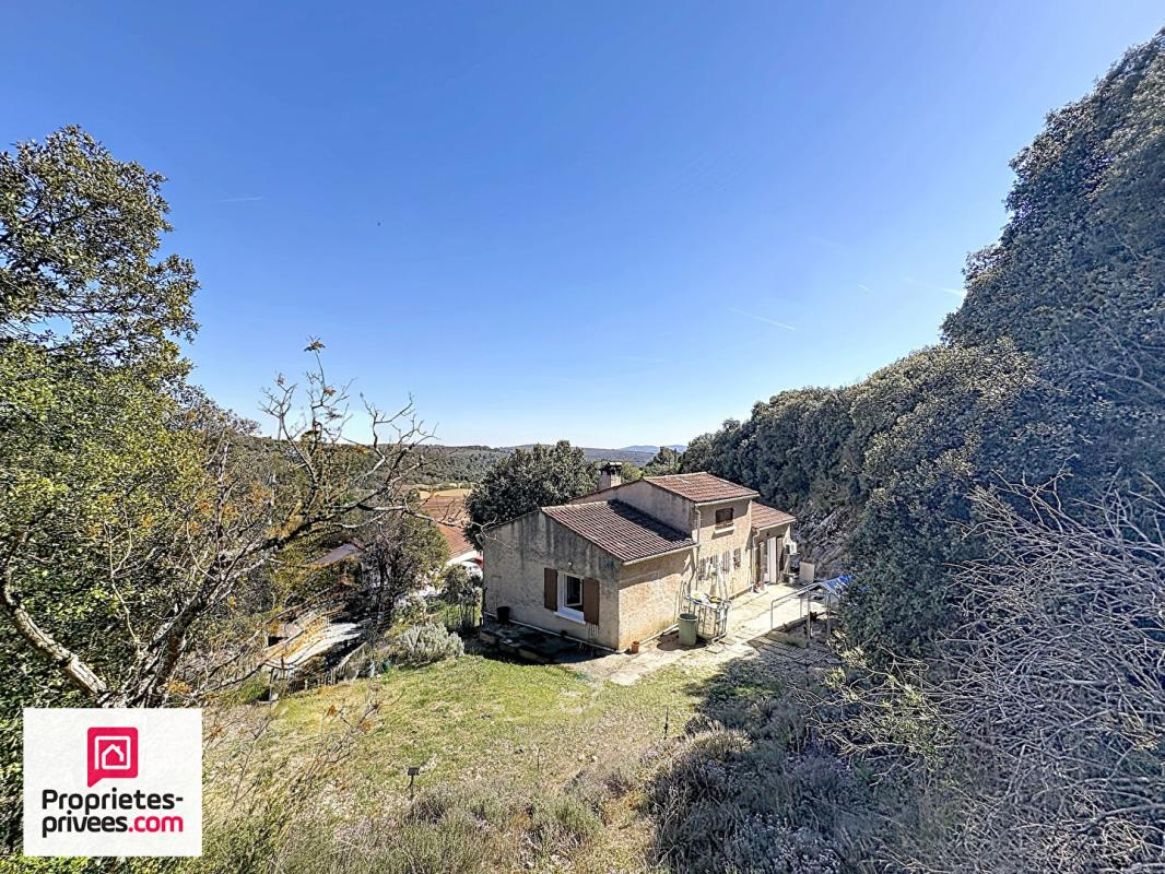 GINASSERVIS Villa avec grand garage sur 2360 m² de terrain divisible 1