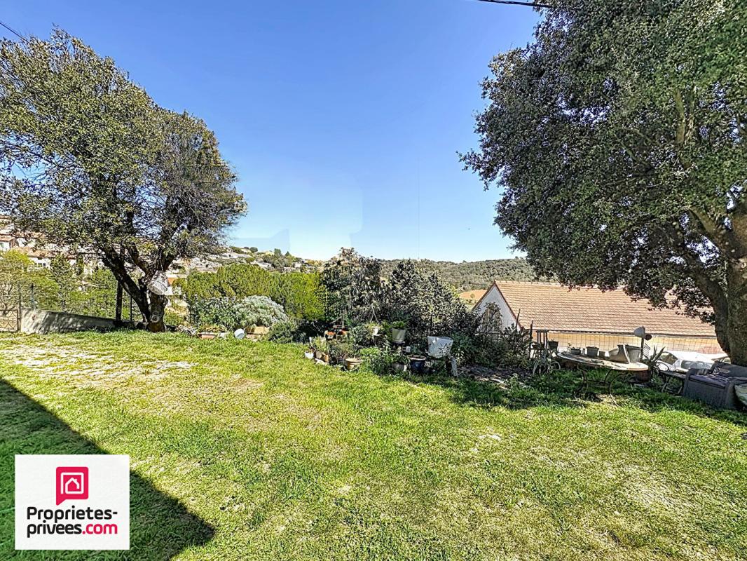 GINASSERVIS Villa avec grand garage sur 2360 m² de terrain divisible 14