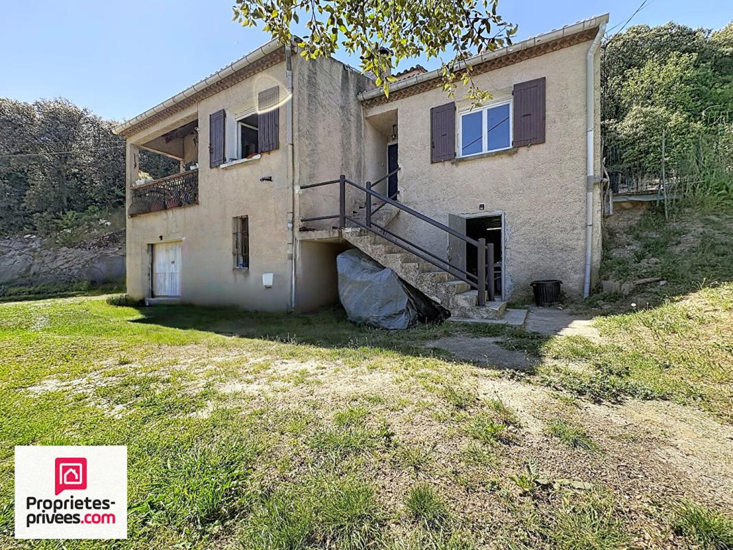 GINASSERVIS Villa avec grand garage sur 2360 m² de terrain divisible 16