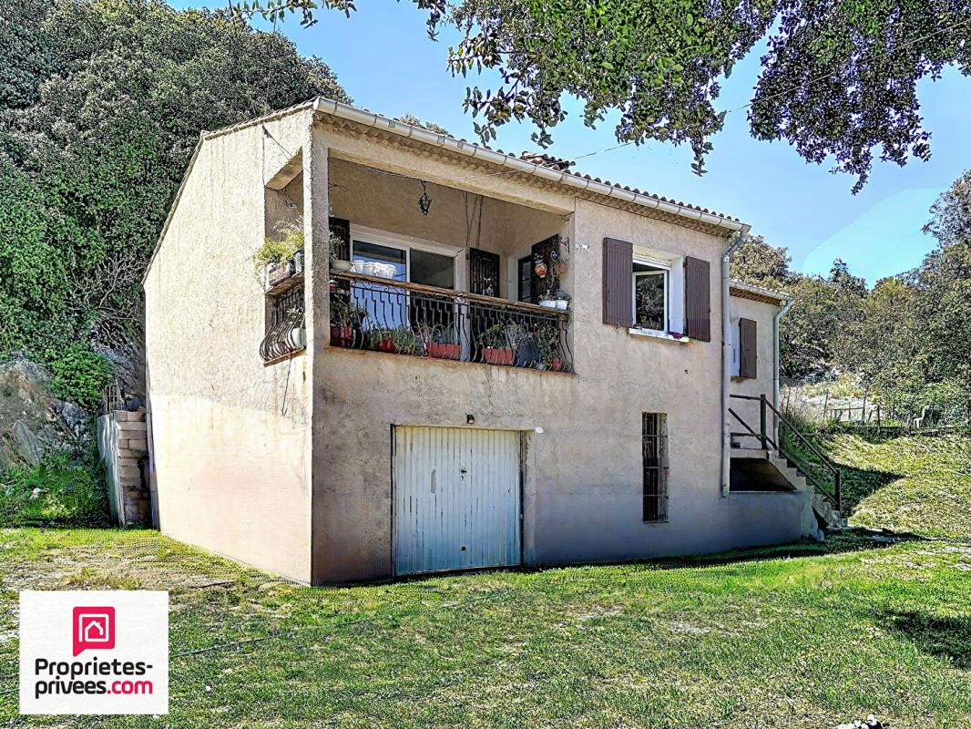 GINASSERVIS Villa avec grand garage sur 2360 m² de terrain divisible 5