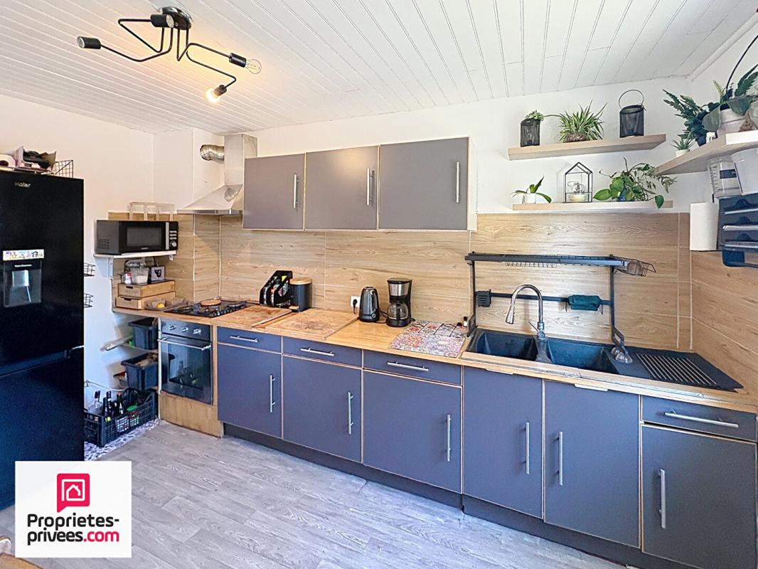 GINASSERVIS Villa avec grand garage sur 2360 m² de terrain divisible 9