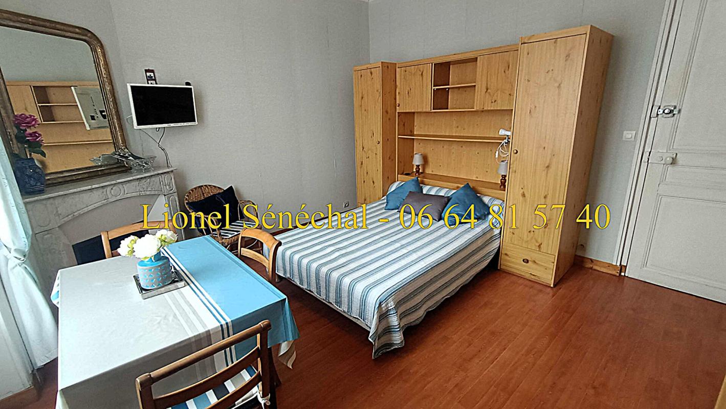 BAGNOLES-DE-L'ORNE Demeure de prestige en pierre de taille avec ses vitraux avec 12 studios pour une superficie de 300 m2 habitables en plein coeur du centre ville de Bagnoles de l'  Orne 10