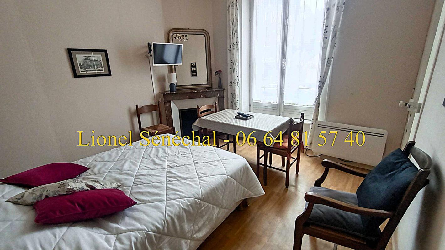 BAGNOLES-DE-L'ORNE Demeure de prestige en pierre de taille avec ses vitraux avec 12 studios pour une superficie de 300 m2 habitables en plein coeur du centre ville de Bagnoles de l'  Orne 11