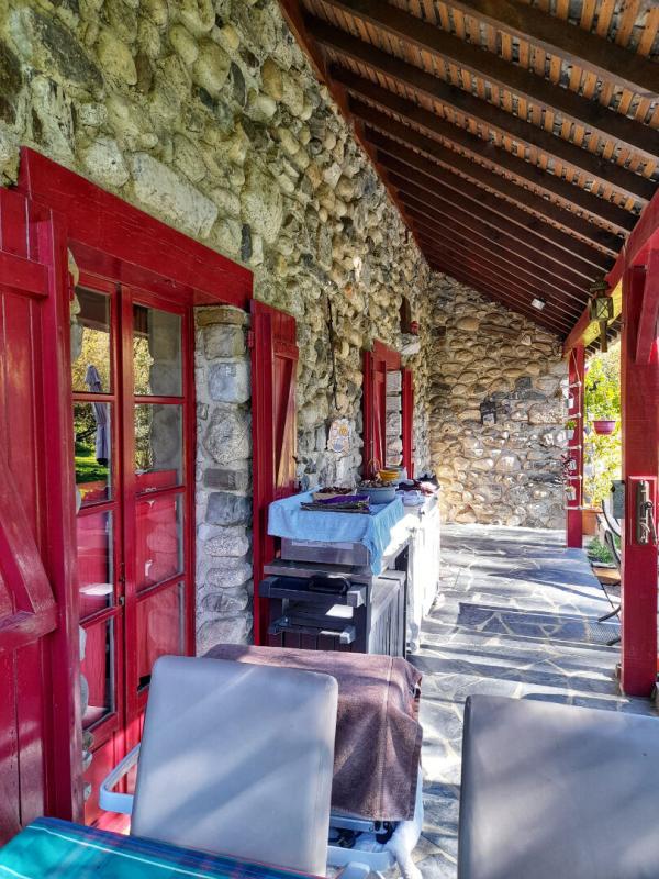 BUZY Charmante demeure en pierre avec vaste sous-sol et jardin paysager 14