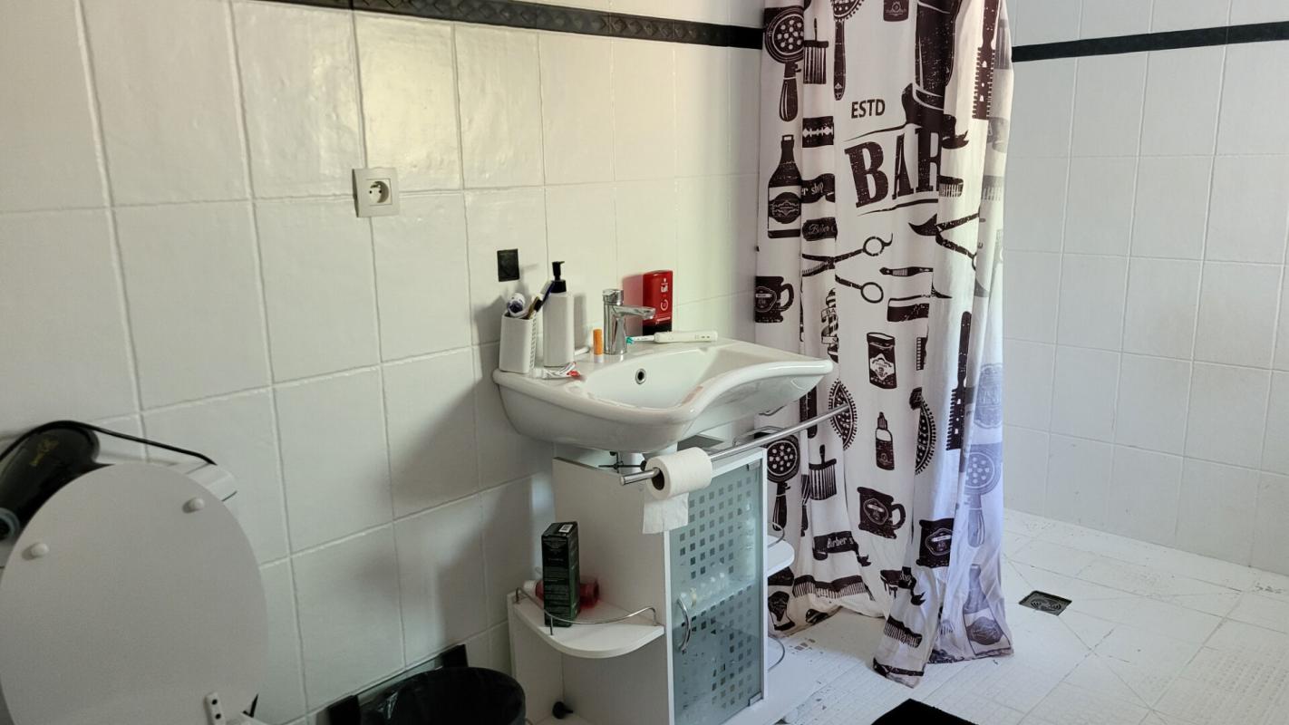 MUSSIDAN Centre ville  Mussidan  maison de 177 m² en pierres rénovation récente  4 chambres terrasse jardin 12