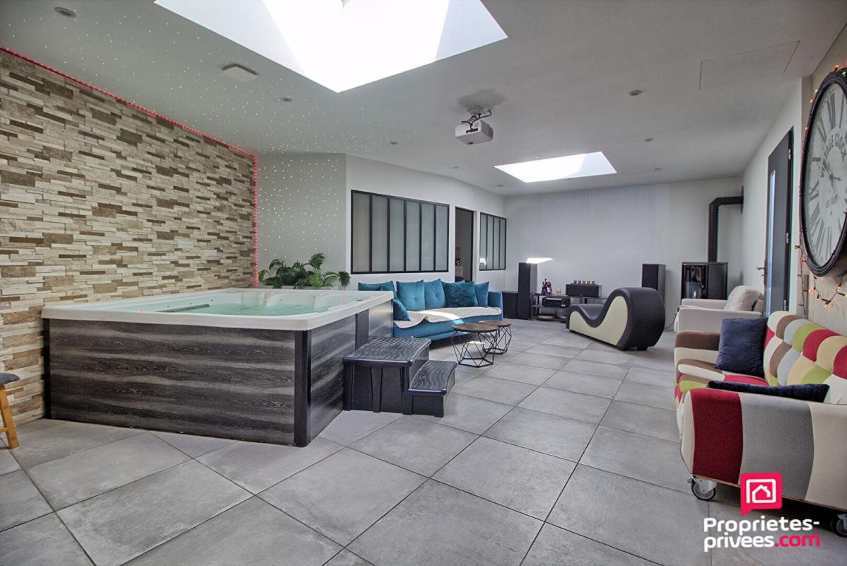 SAINT-BARTHELEMY-D'ANJOU Maison Saint Barthelemy D Anjou 8 pièce(s) 220 m2 4