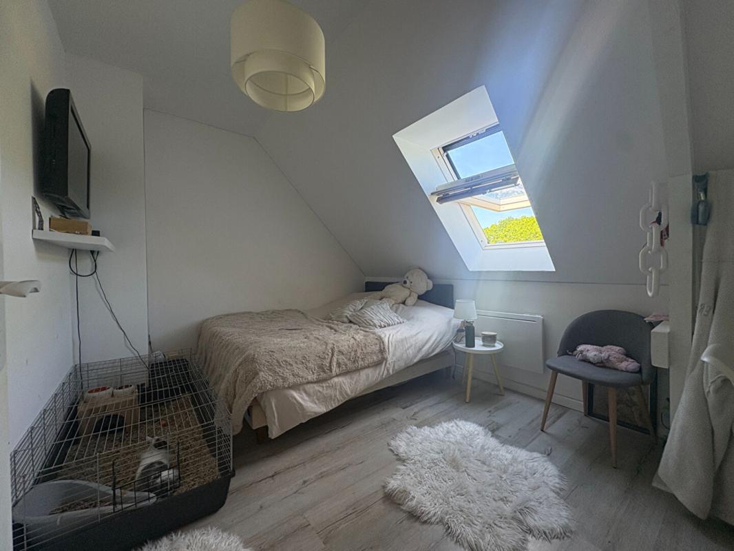 BAUNE Maison située en bourg, à proximité d'Angers 11