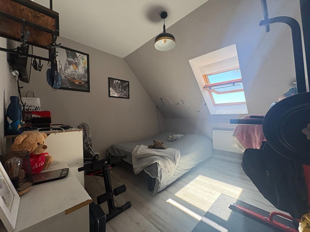 BAUNE Maison située en bourg, à proximité d'Angers 14