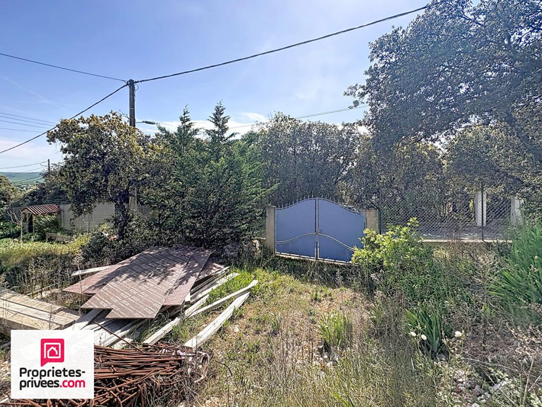 GINASSERVIS Terrain à bâtir 636 m²  viabilisé avec PC 4
