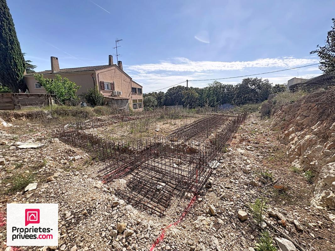 GINASSERVIS Terrain à bâtir 636 m²  viabilisé avec PC 5