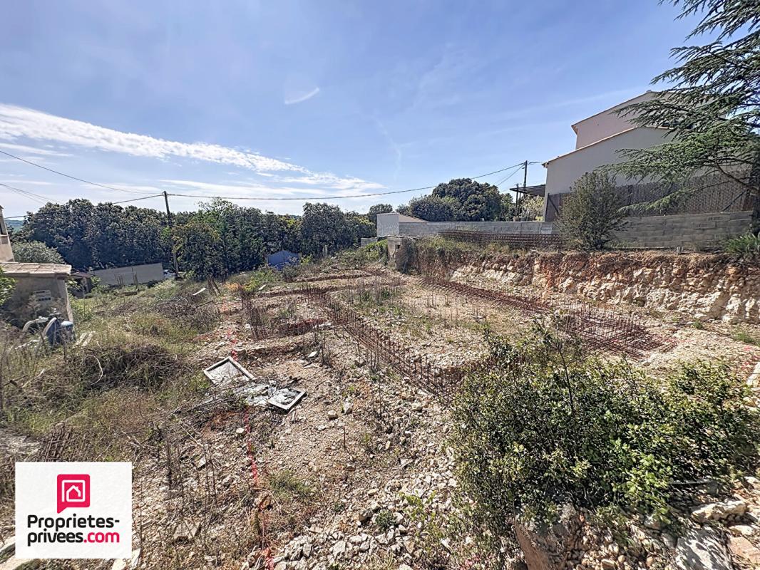 GINASSERVIS Terrain à bâtir 636 m²  viabilisé avec PC 9