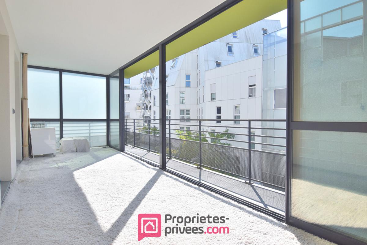 BOULOGNE-BILLANCOURT Appartement  3 pièces 66,03 m² Carrez  avec 18 m² de jardin d'hiver et 8 m² de balcon filant 10