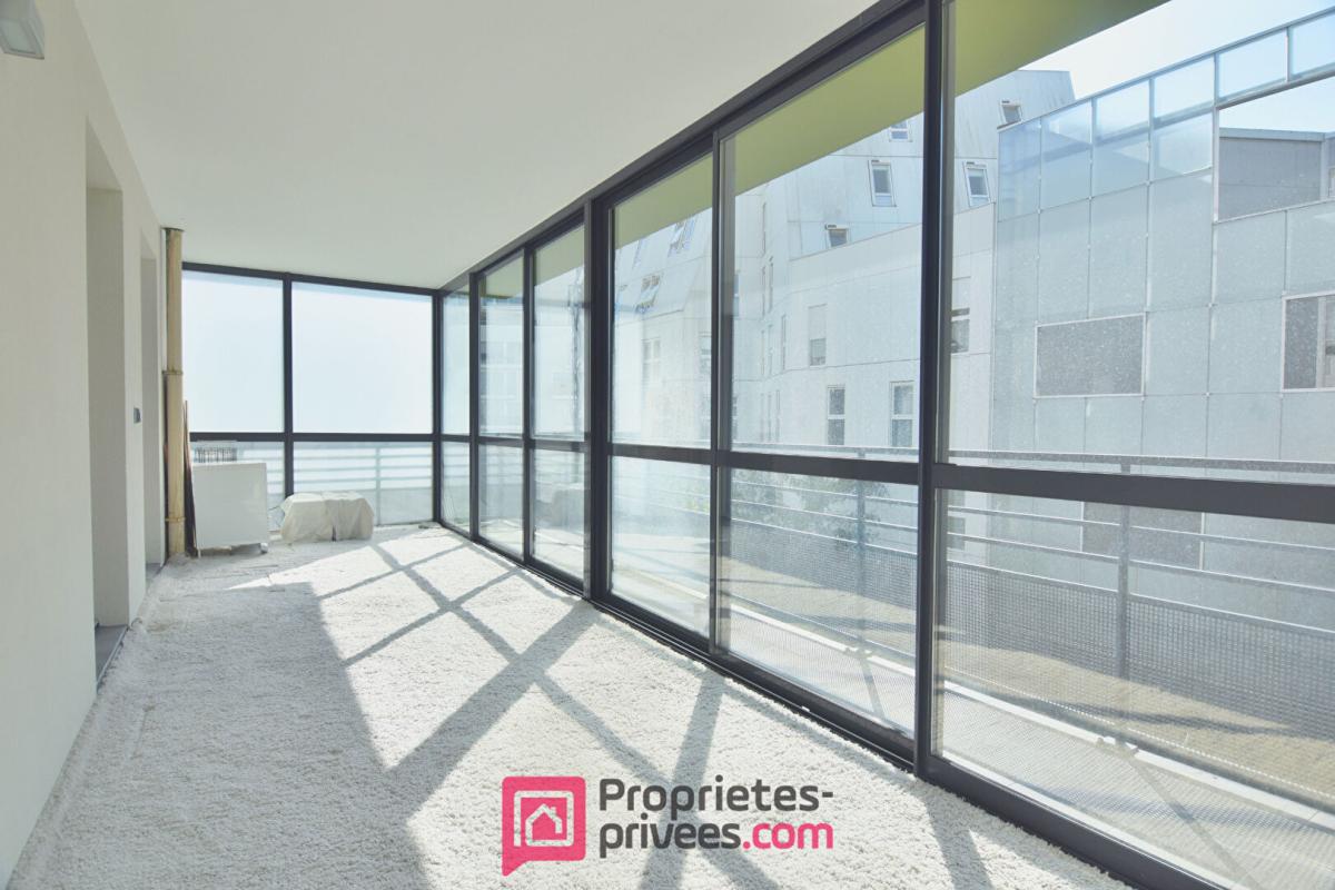 BOULOGNE-BILLANCOURT Appartement  3 pièces 66,03 m² Carrez  avec 18 m² de jardin d'hiver et 8 m² de balcon filant 11