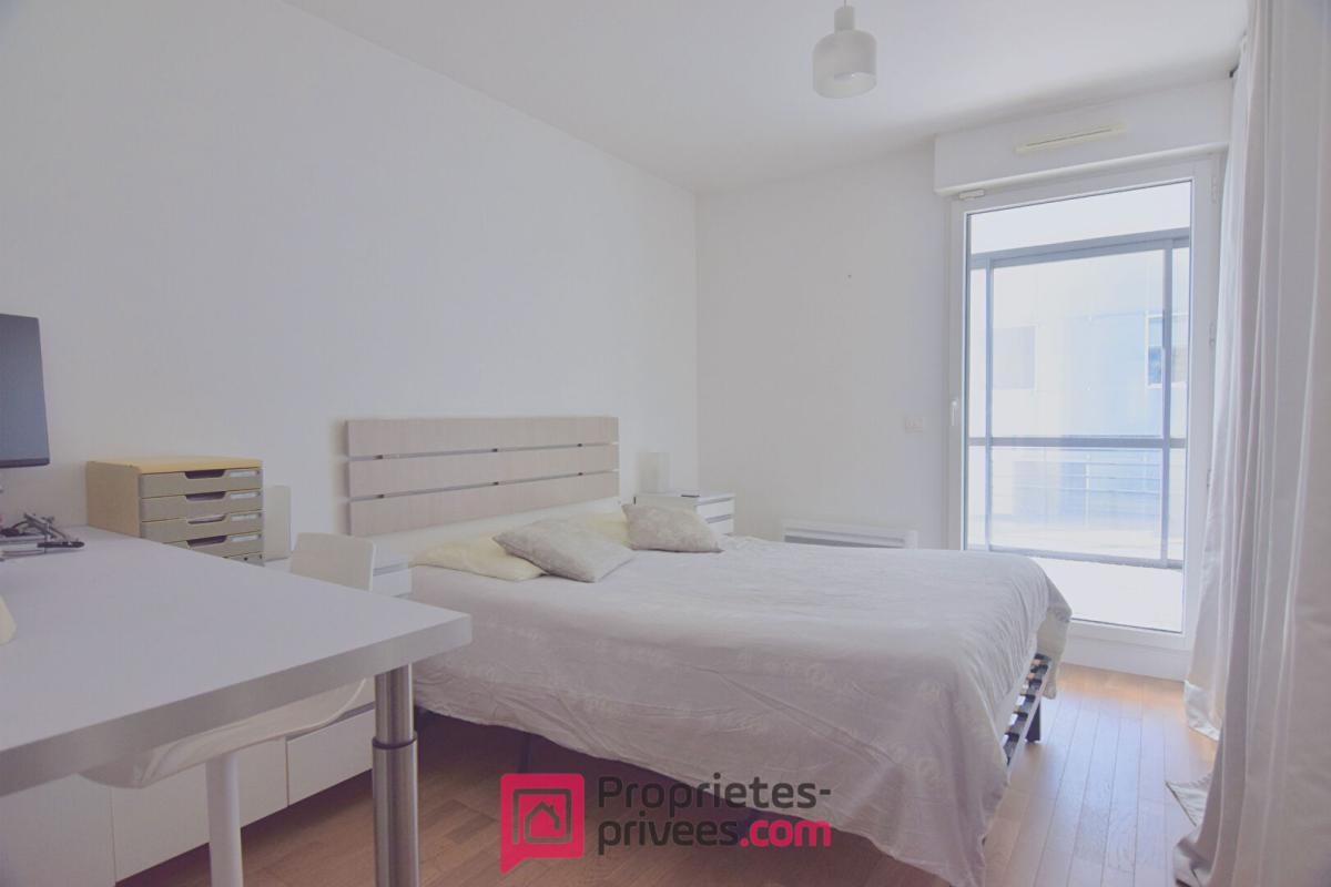 BOULOGNE-BILLANCOURT Appartement  3 pièces 66,03 m² Carrez  avec 18 m² de jardin d'hiver et 8 m² de balcon filant 6