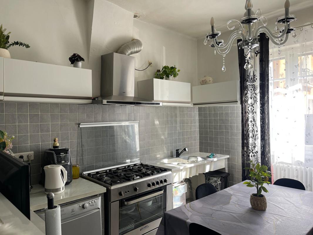 ALES A vendre maison mitoyenne 3 pièces de 65 m2 avec grand garage sur terrain de 295 m2 4