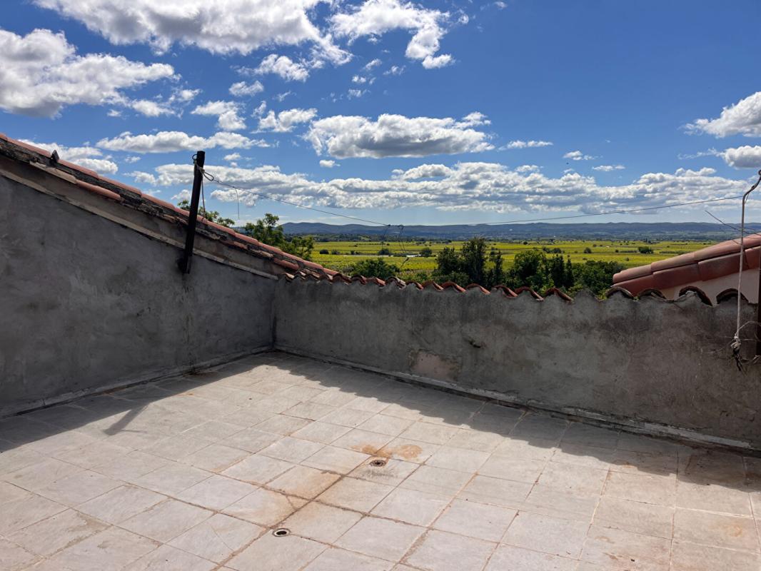 SAINT-SATURNIN-DE-LUCIAN Maison de village traversante avec terrasse et atelier 12