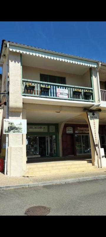 GEAUNE Immeuble comprenant un appartement et un local commercial au rdc 1