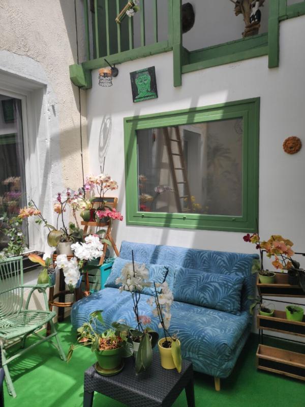 GEAUNE Immeuble comprenant un appartement et un local commercial au rdc 10