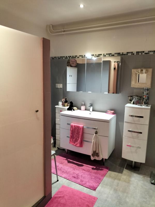 GEAUNE Immeuble comprenant un appartement et un local commercial au rdc 14