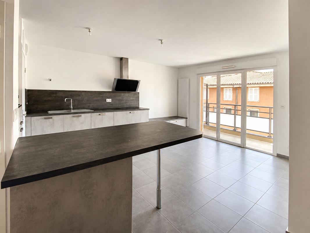 SAINT-LAURENT-SUR-SAONE À vendre - Appartement T3 lumineux avec balcon et garage - Saint-Laurent-sur-Saône (01750) 1