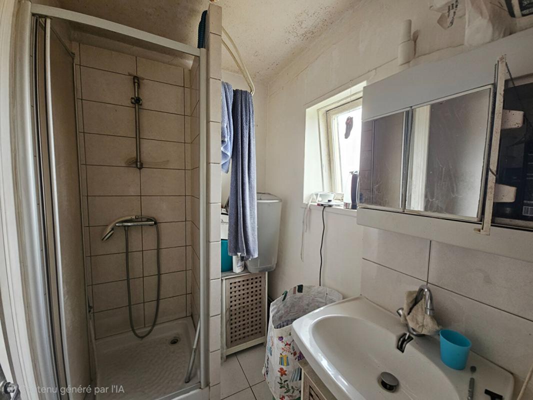 DONVILLE-LES-BAINS Appartement T2 loué - Proche Mairie de Donville 3