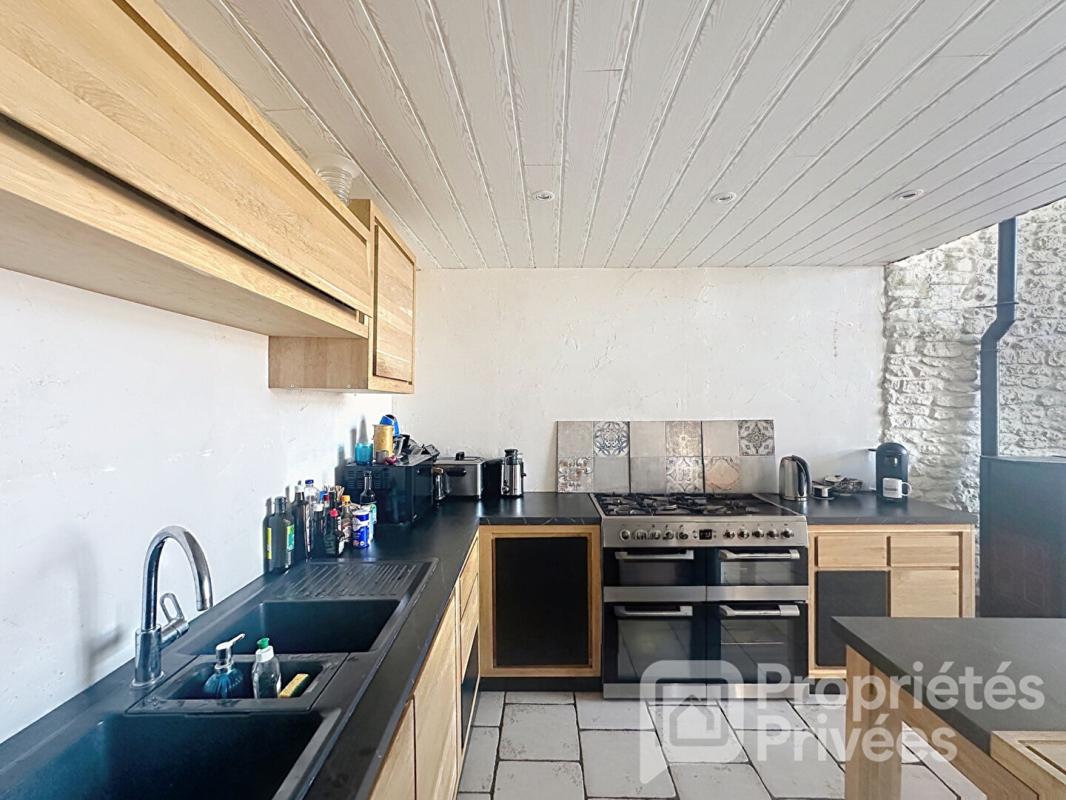 ANDILLY Maison de caractère pierres et bois 145 m² 9