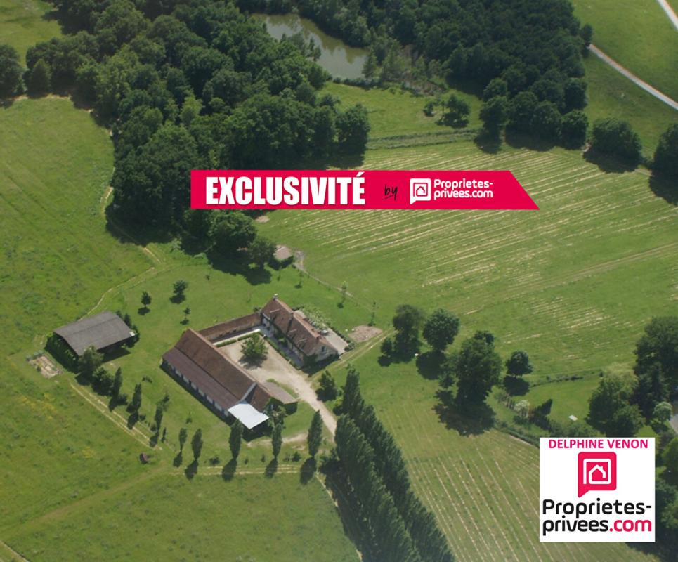 SIGLOY Exclusivité - Propriété avec beaucoup de cachet proche de Tigy ; Longère, Ecuries, piste d'entrainement, prés, bois et plan d'eau sur 20 hectares environ 1