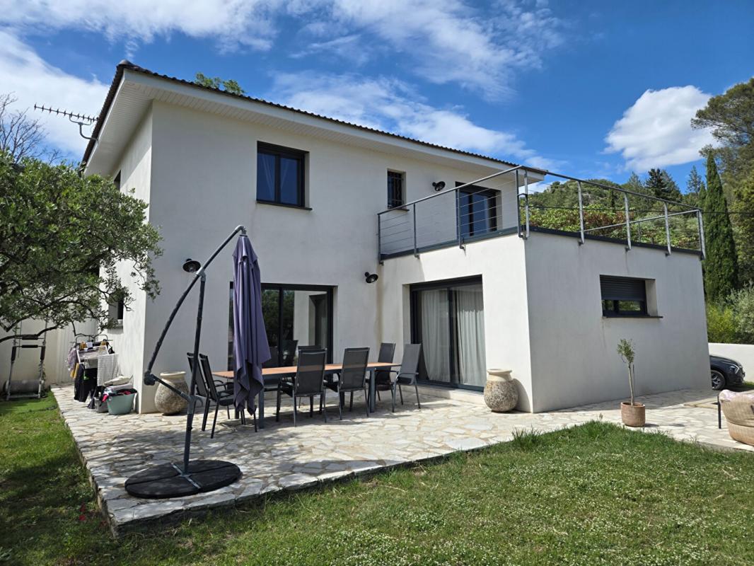 ANDUZE Villa de 124.7 M2 avec piscine et garage sur un terrain clos et arboré de 735 M2 au calme sans vis à vis 1