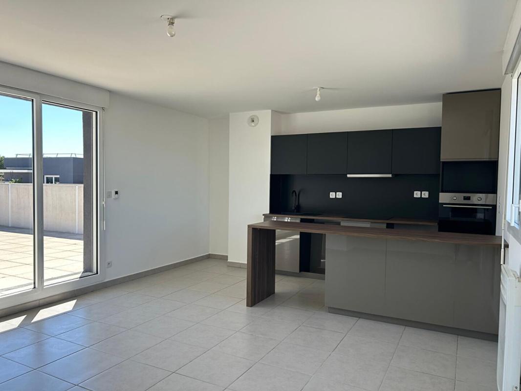 CASTELNAU-LE-LEZ Appartement T3 en attique avec grande terrasse 3