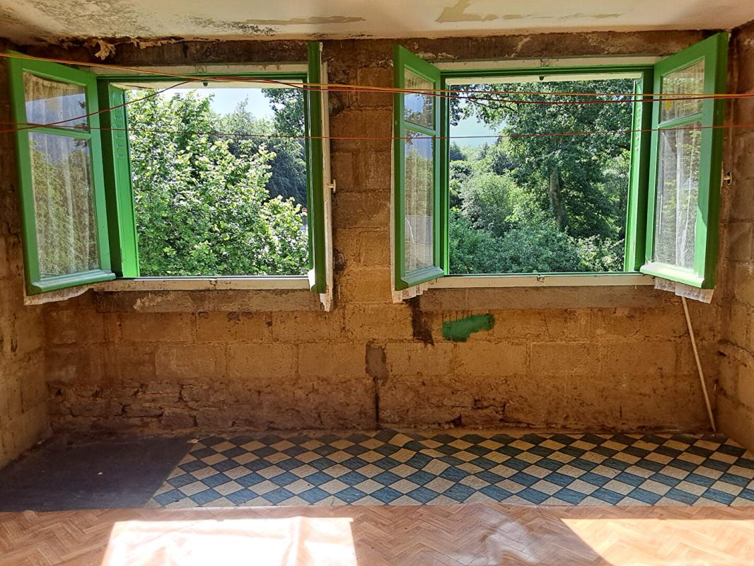 LANOUEE Maison des années 60 indépendante  sur un grand terrain à fort potentiel Aux portes de la forêt (Morbihan) 17