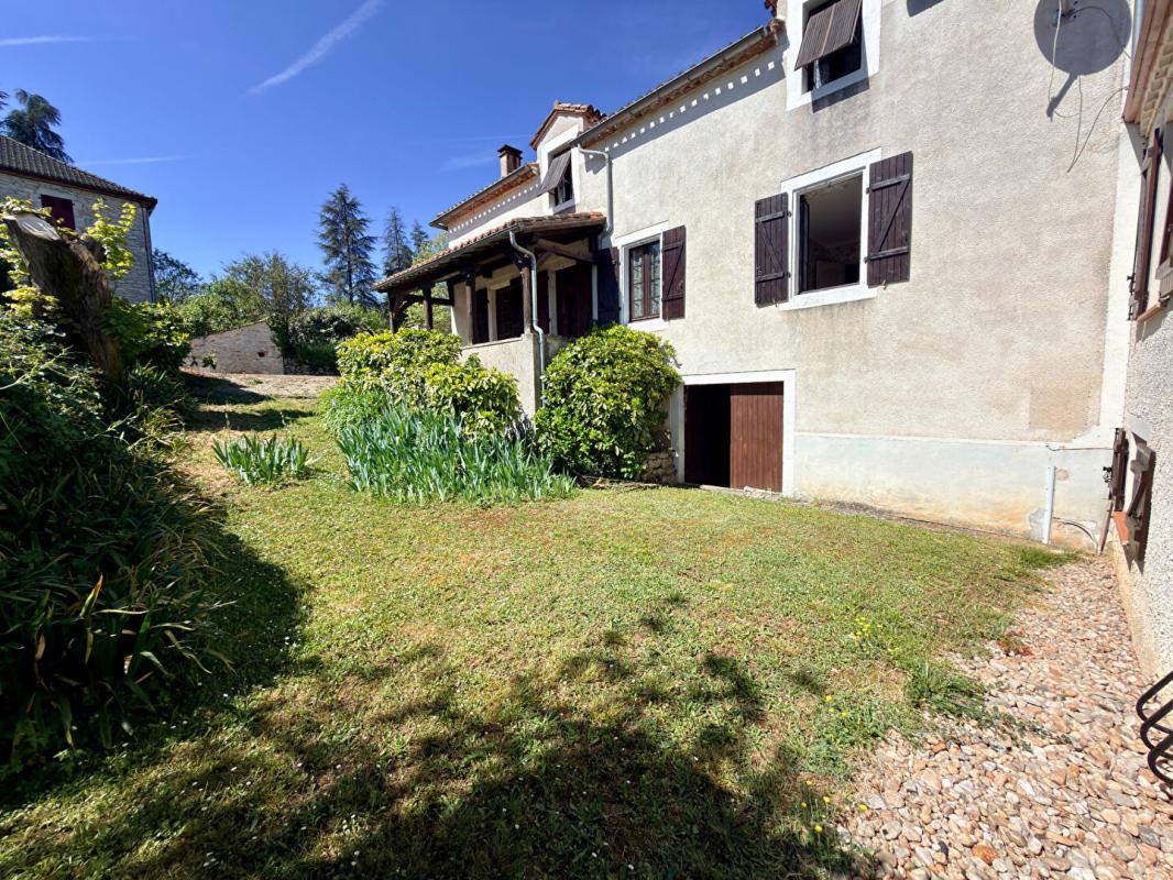 CAHORS Maison T5 avec sous-sol et jardin 1