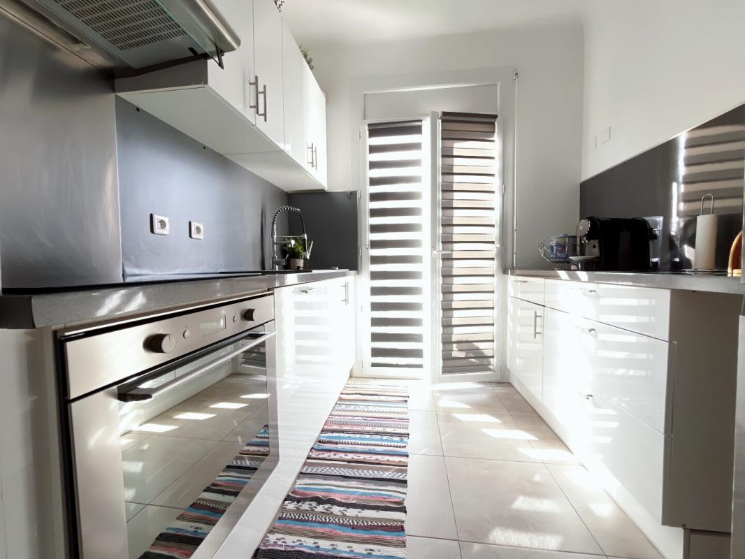 PERPIGNAN Magnifique appartement T3 de 77 m2  avec garage, situé au second et dernier étage sans ascenseur d'une petite copropriété aux faibles charges 9