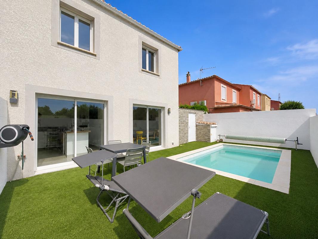 MONTADY Villa T5 avec piscine, 4 chambres et garage 2
