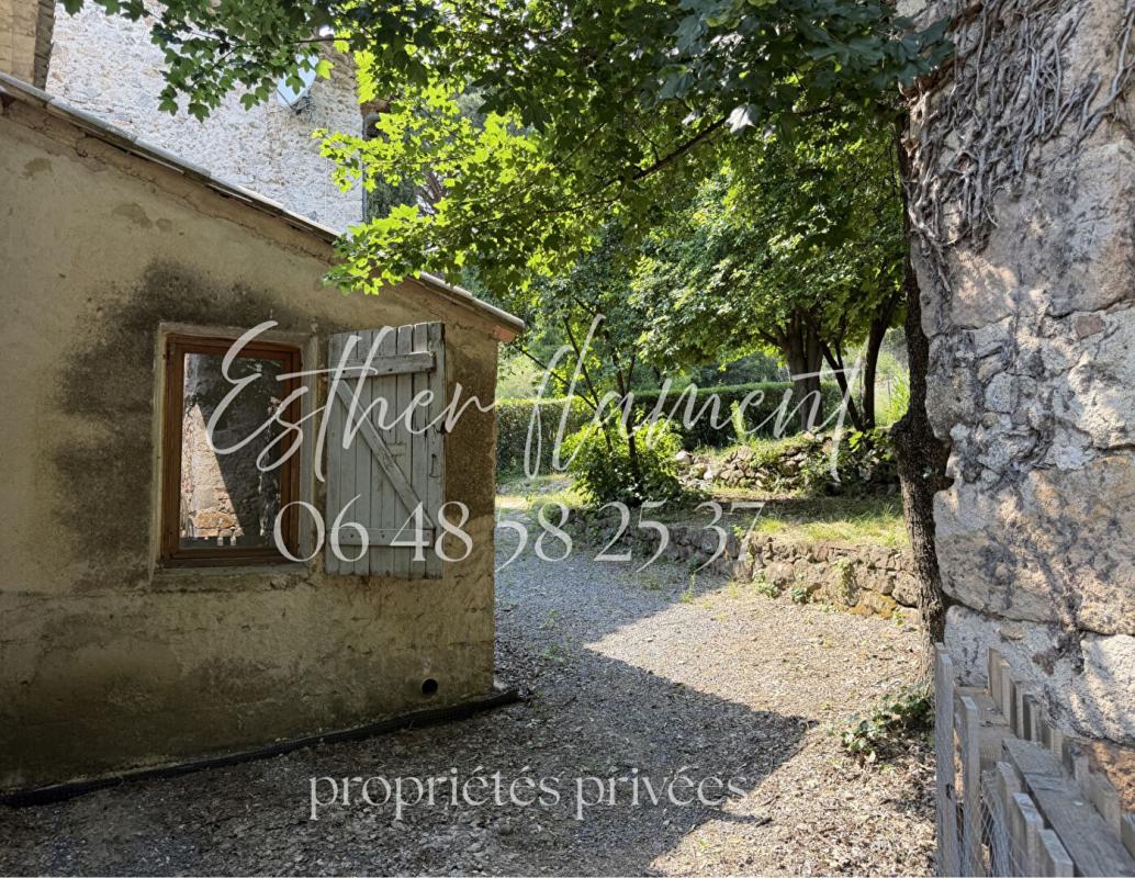 THOIRAS MAISON EN PIERRE, 2 HABITATIONS AVEC SOURCE et PUITS SUR 2500 m2 PROCHE ANDUZE 13
