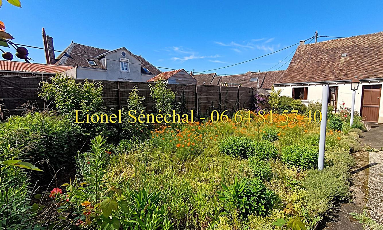 SOULIGNE-SOUS-BALLON Maison de bourg de plain - pied 6 pièces de 102 m2 avec un grand garage sur une parcelle de 400 m2 7