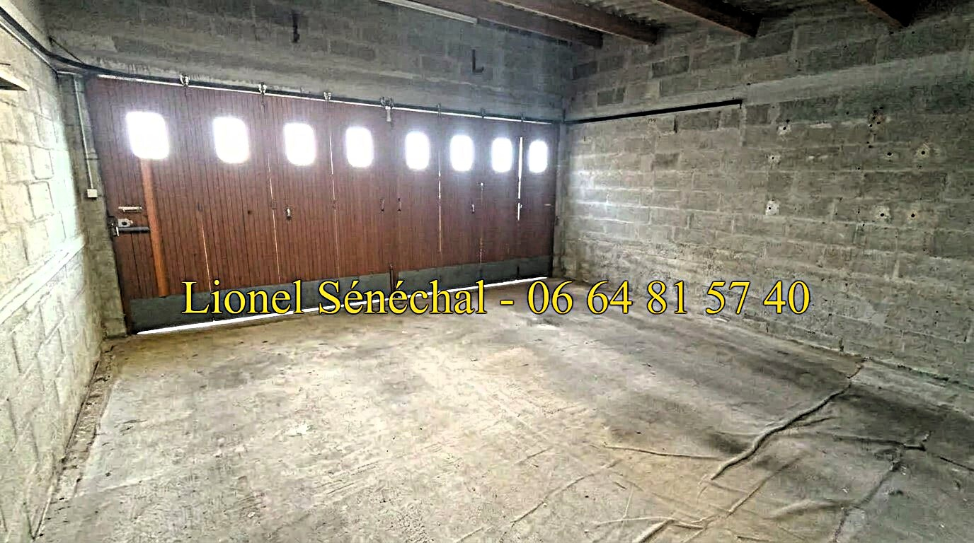 SOULIGNE-SOUS-BALLON Maison de bourg de plain - pied 6 pièces de 102 m2 avec un grand garage sur une parcelle de 400 m2 9