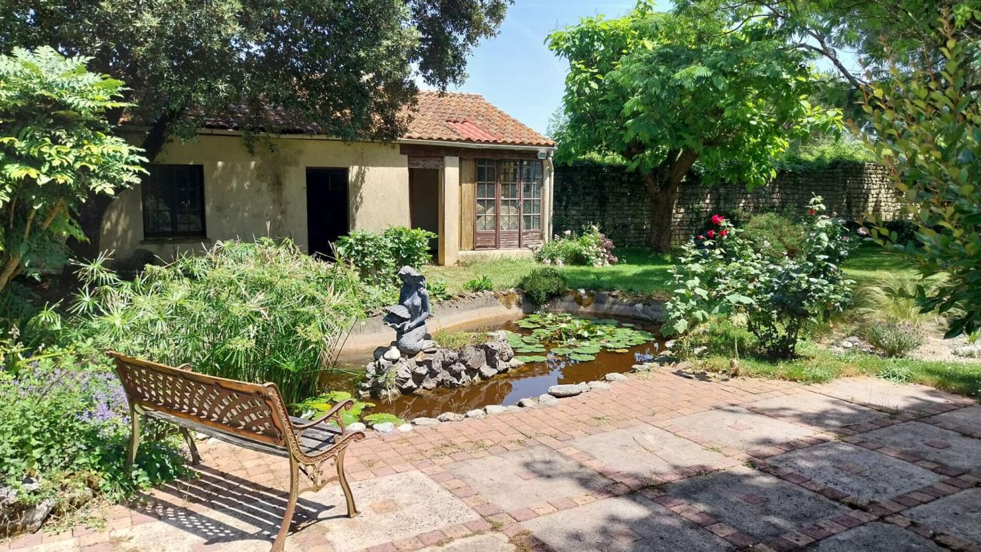 PONT-L'ABBE-D'ARNOULT BELLE MAISON T6 AVEC PARC ARBORÉ ET PISCINE 8