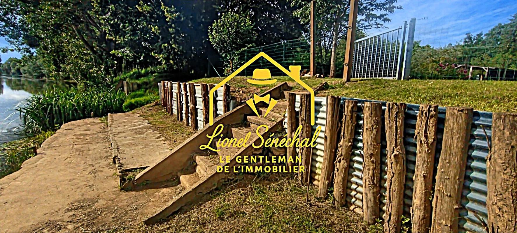 NEUVILLE-SUR-SARTHE Terrain de loisirs de plus de 1 200 m2 avec un préau sur une dalle en dur, un abri de jardin et un accès direct à la rivière 5